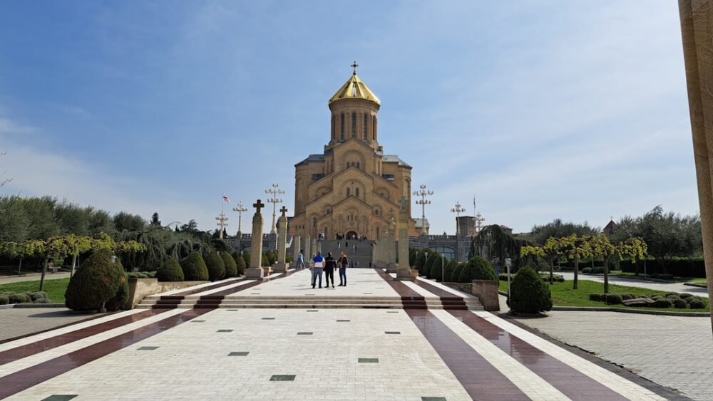 A large building with a golden dome on top of it