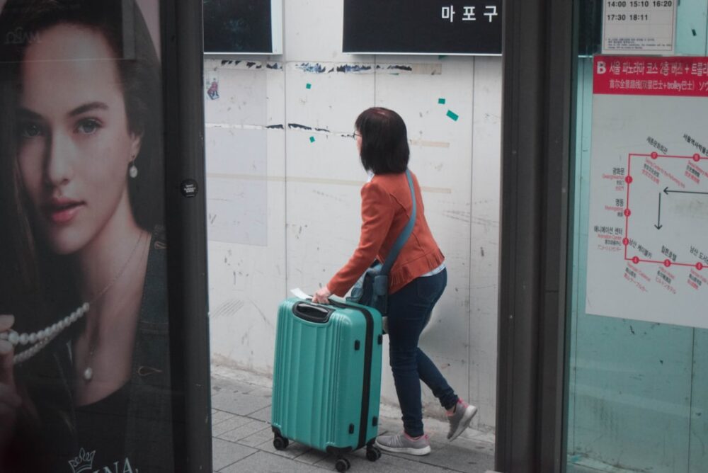 korea passport suitcase travel preparation