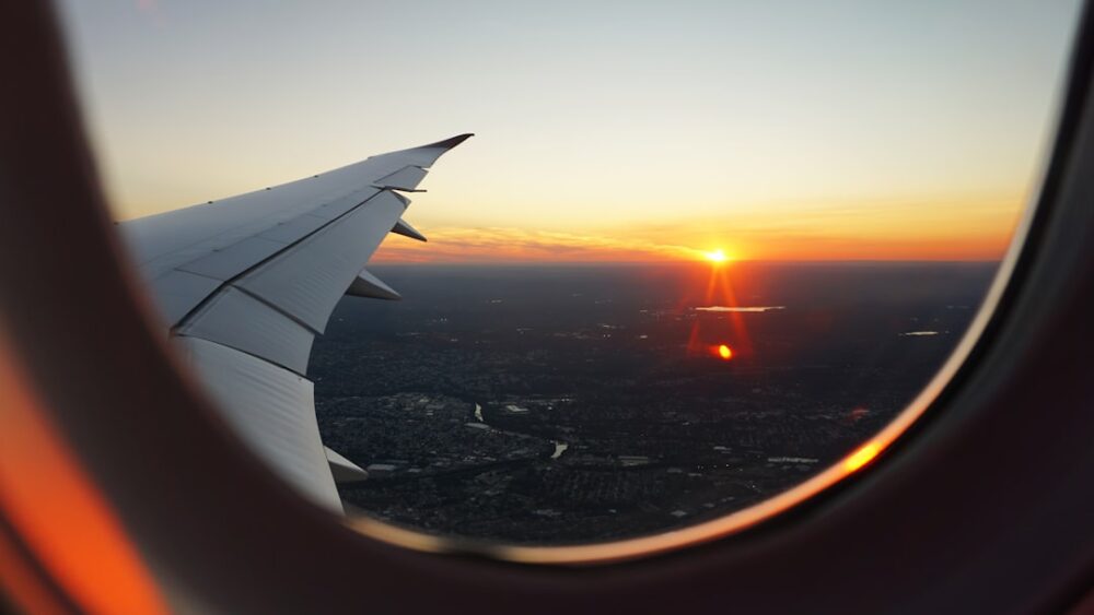 sunrise airplane window travel departure