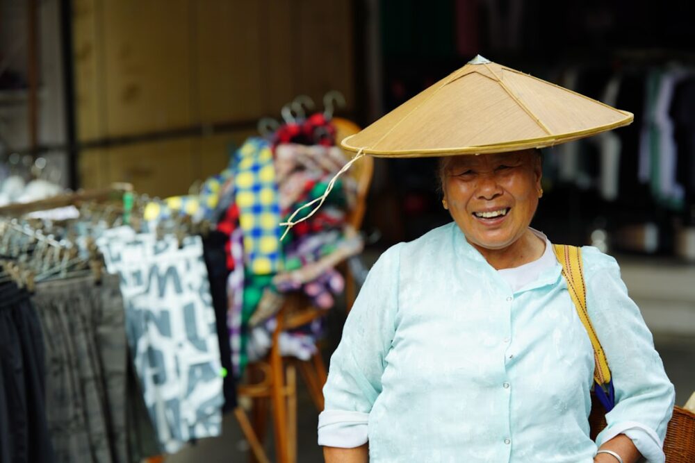 traveler talking with local people market asia